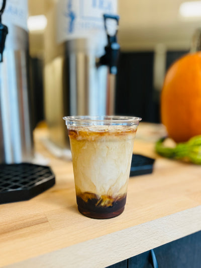 Coffee cup from local cafe, photographed by Massey Media